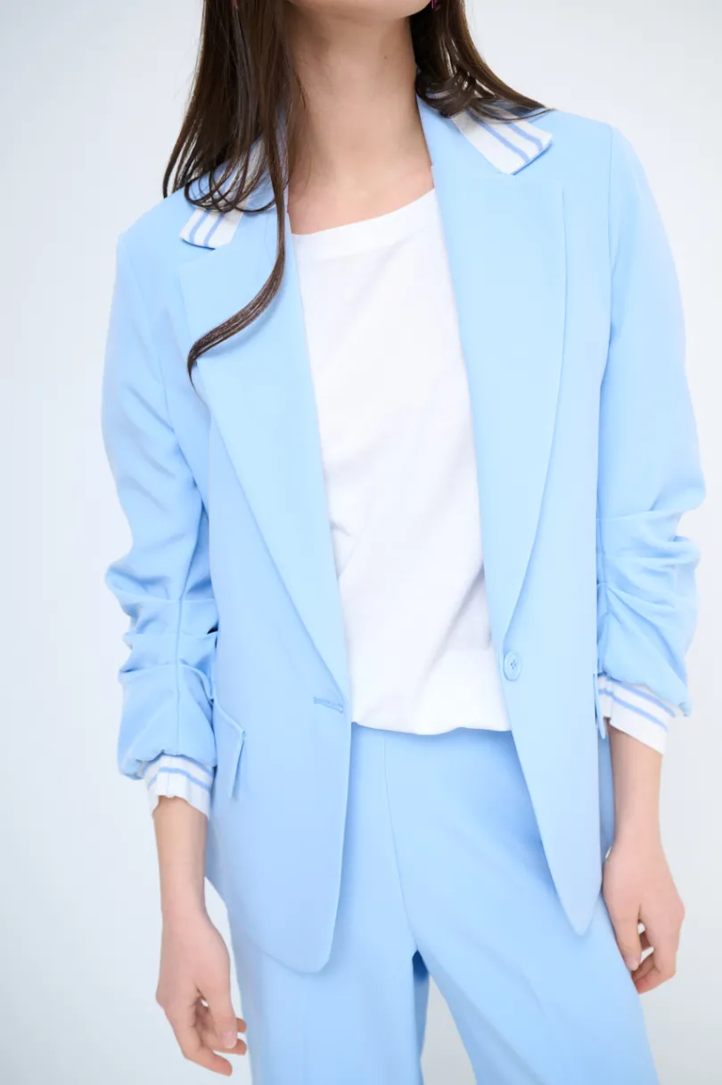 Sale KIKISIX GIACCA OVER CON POLSINO MANICA CELESTE