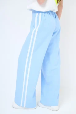 New KIKISIX PANTALONE LARGO CON BANDA CELESTE